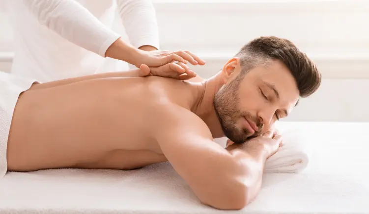Deep tissue massage therapy at Q Healthy Spa